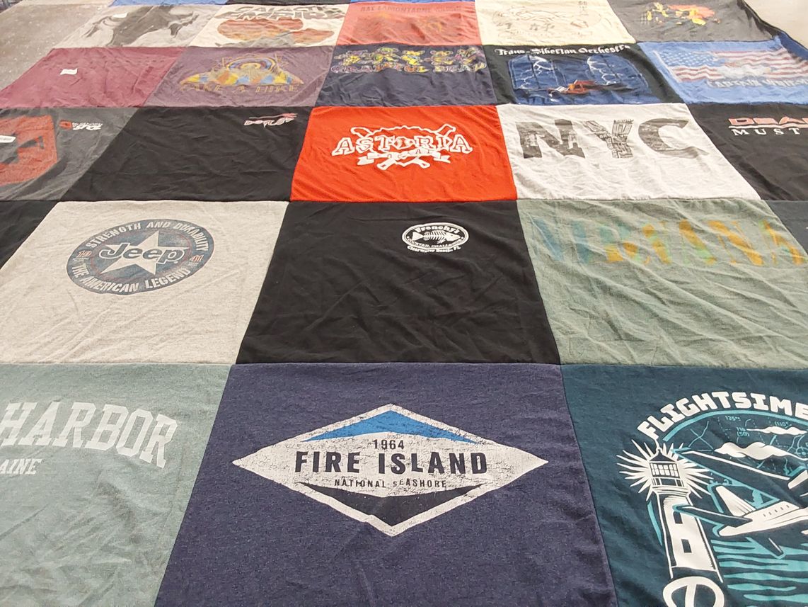 T-shirt quilt with music, travel themes by Susan from NY