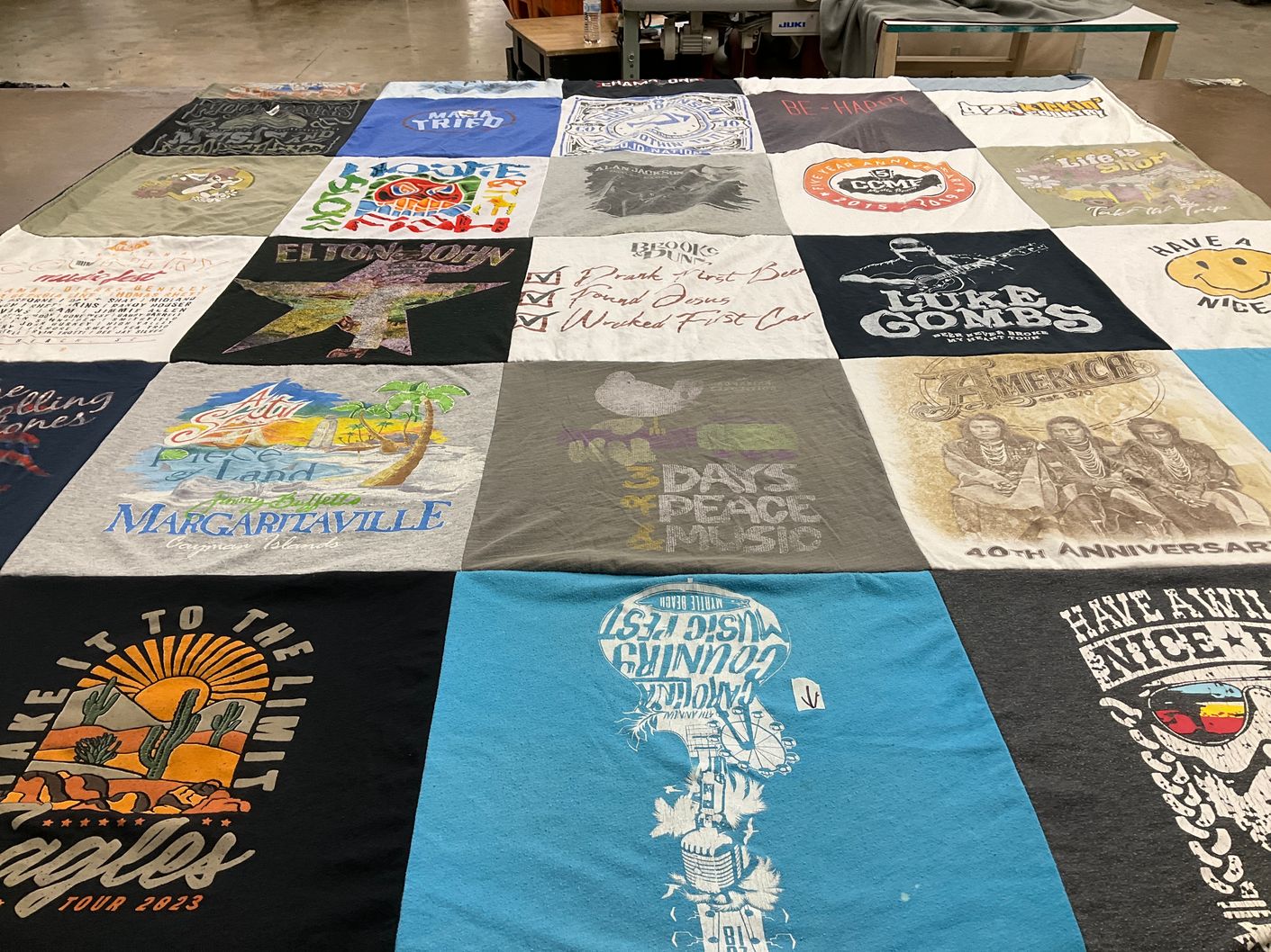 T-shirt quilt with music, travel themes by Heidi from SC
