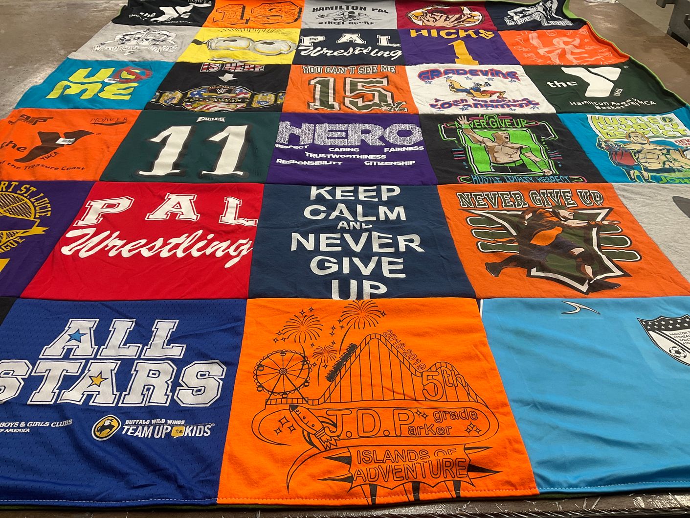 T-shirt quilt with wrestling, youth programs themes by Mauda from FL