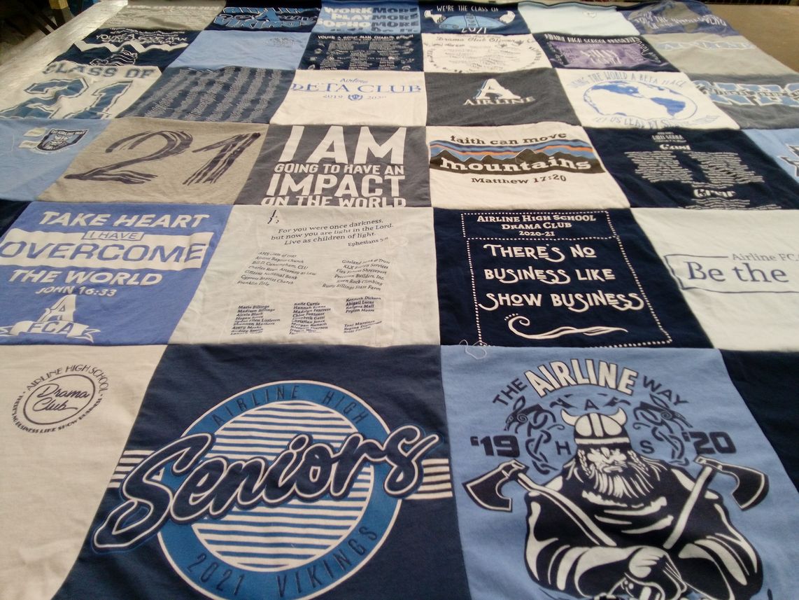 T-shirt quilt featuring airline high school vikings by Michelle from LA