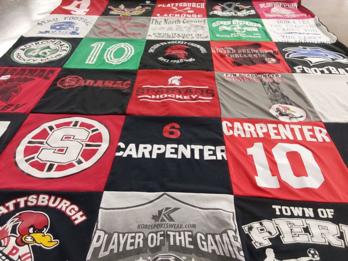 T-shirt quilt featuring saranac hockey, spartan hockey by Laura from NY