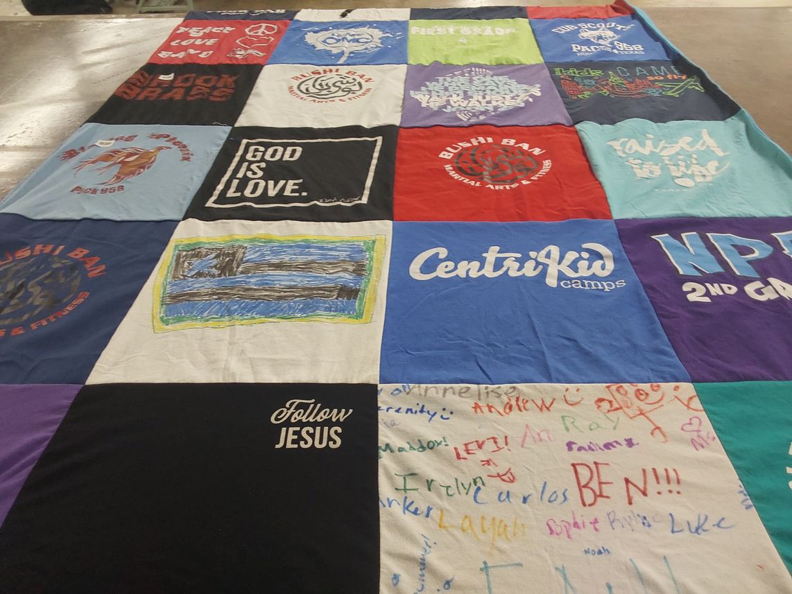T-shirt quilt with camping, martial arts themes by Tiffany from TX