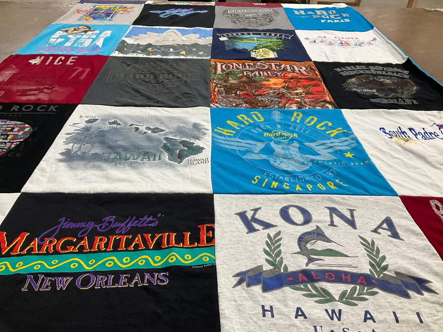 T-shirt quilt with travel, music themes by Debra from TX