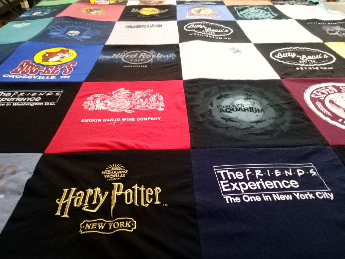 T-shirt quilt with travel, entertainment themes by Penny from PA