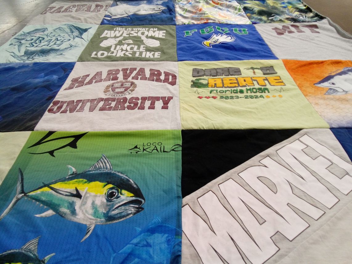 T-shirt quilt from harvard university, peru university by Tammy from FL