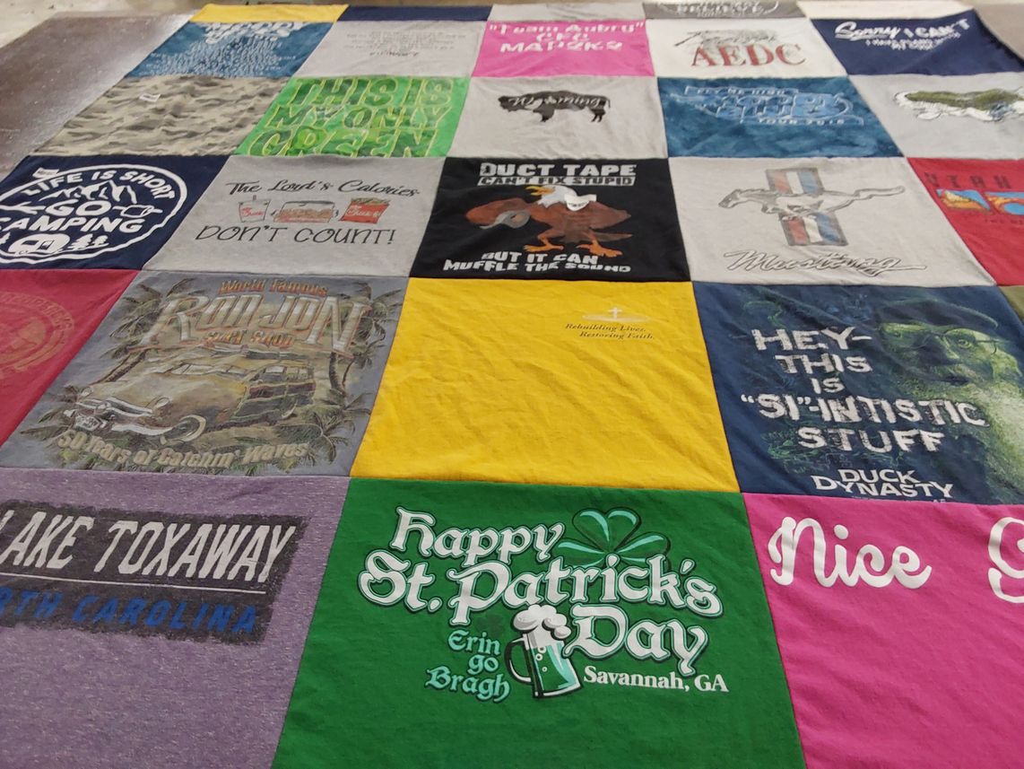 T-shirt quilt with camping, running themes by Joel from FL