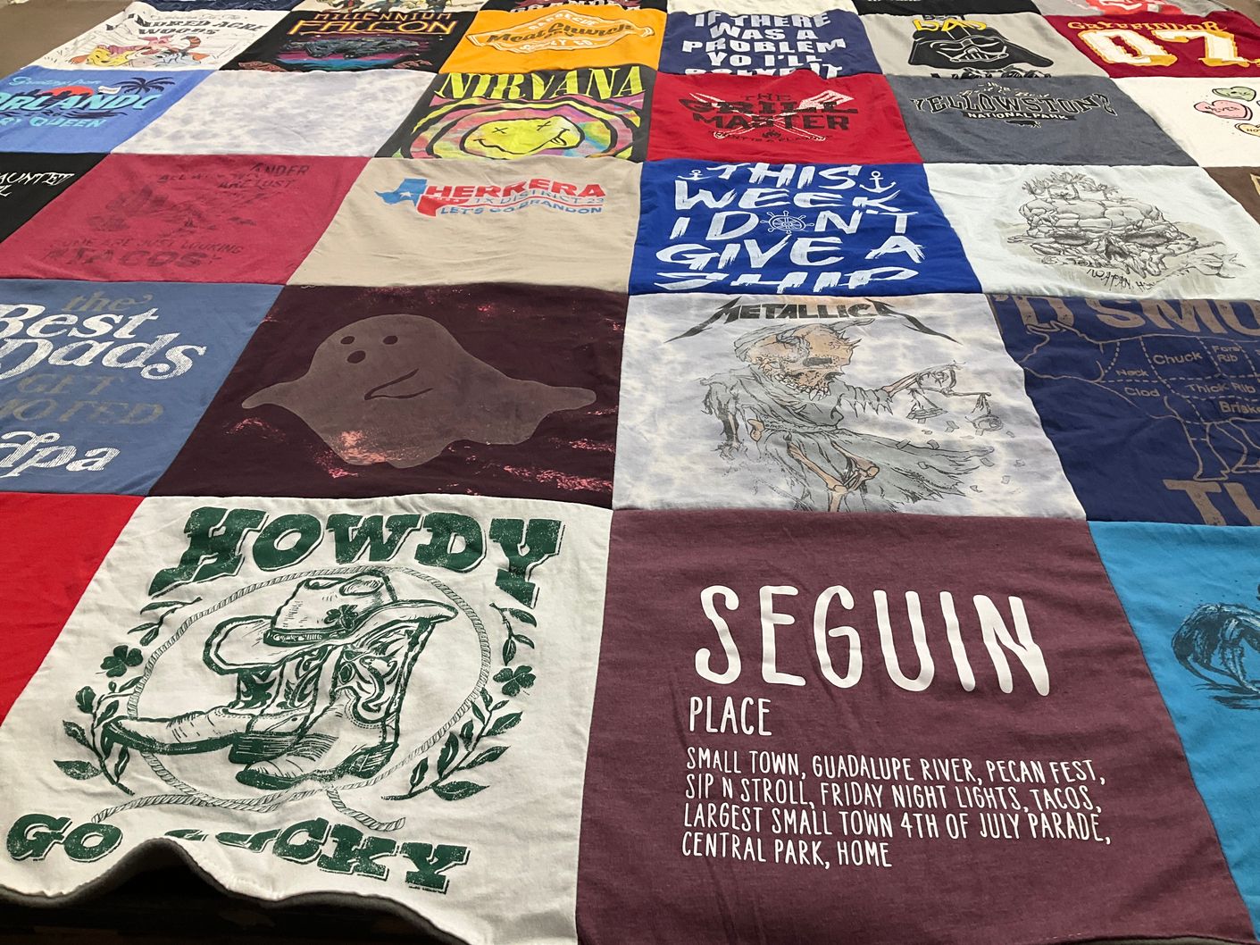 T-shirt quilt with music, local history themes by Kathleen from TX