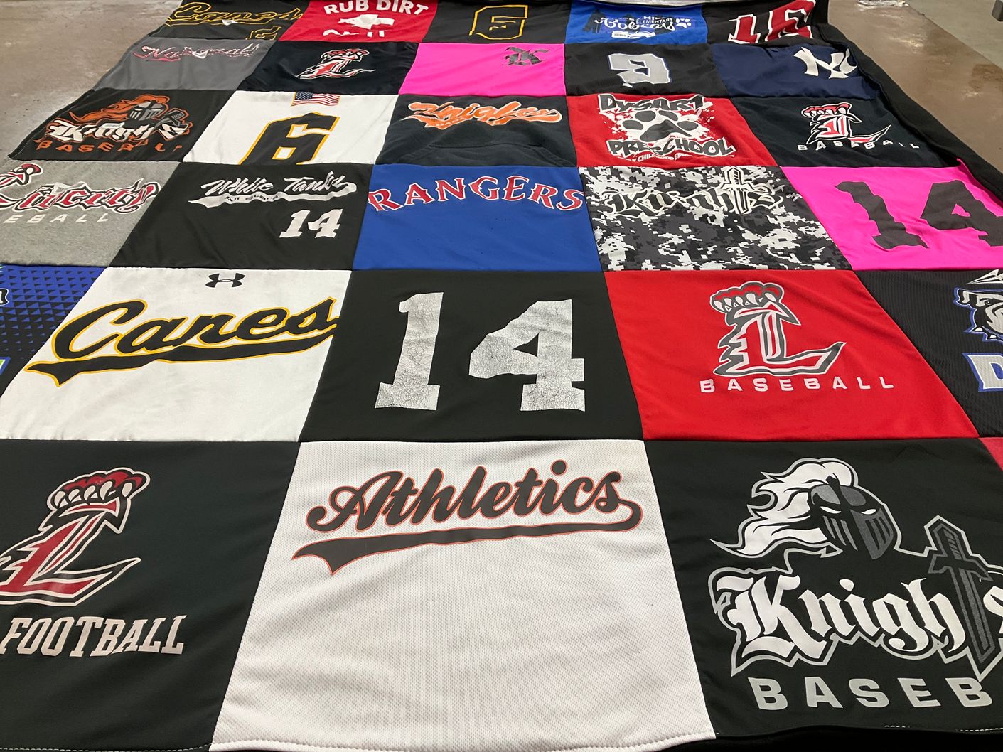 T-shirt quilt featuring l baseball, l football by Lisa from AZ