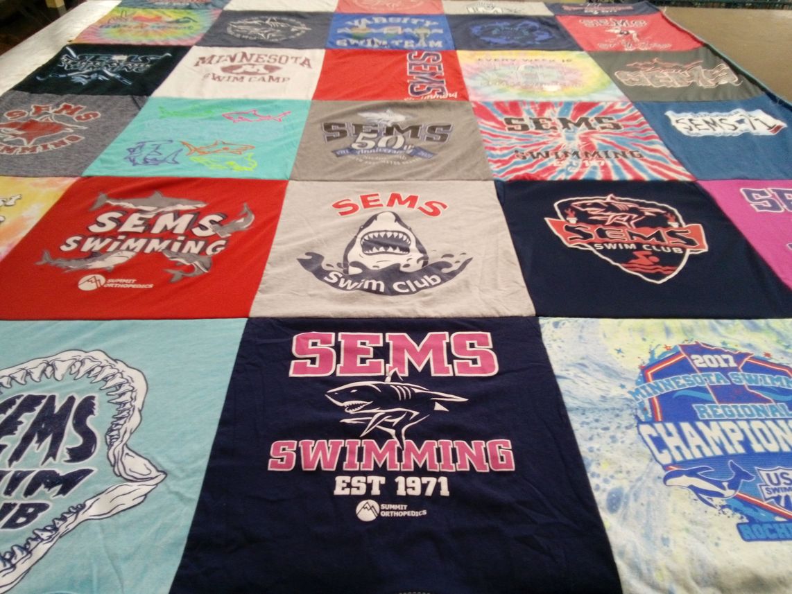 T-shirt quilt with swimming, sports themes by Megan from MN