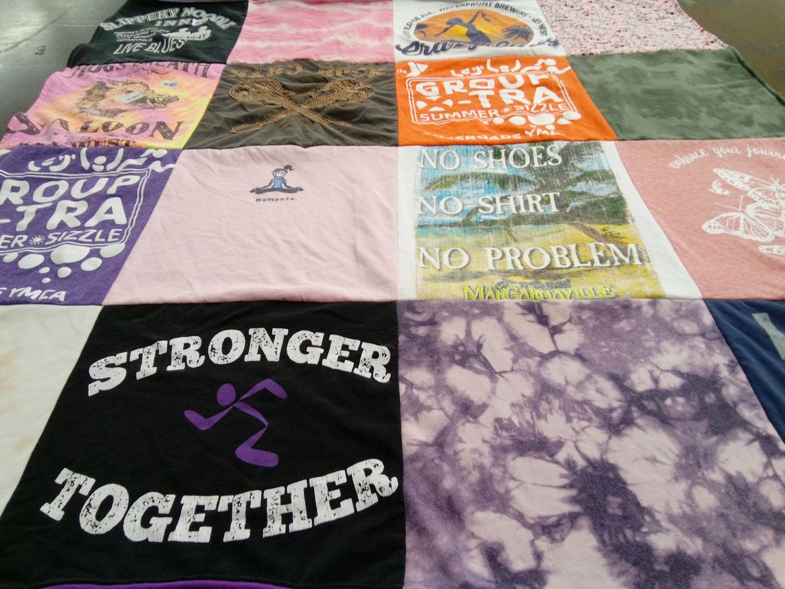 T-shirt quilt with fitness, community themes by Christina from IN
