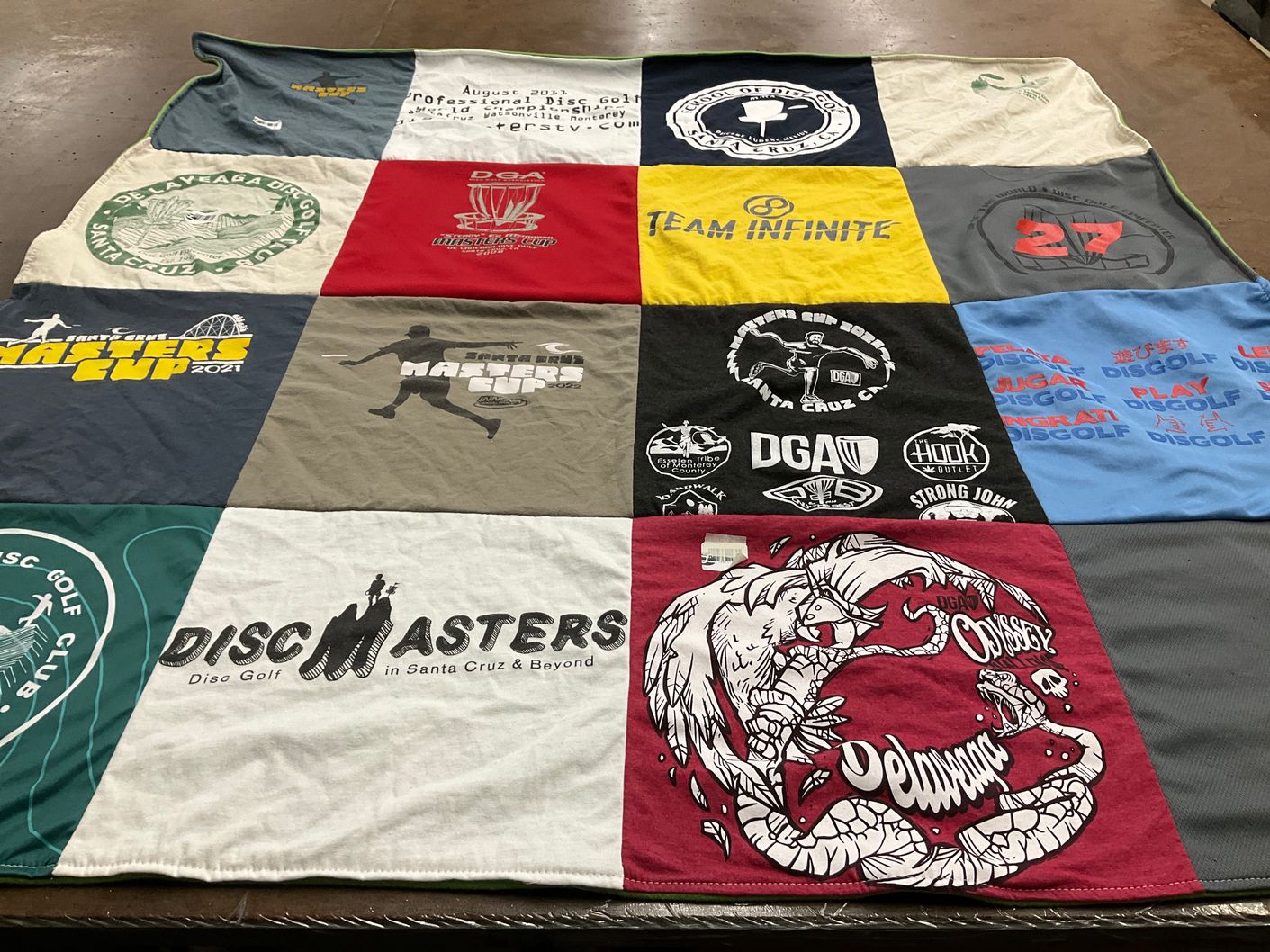 T-shirt quilt with disc golf themes by John A from CA
