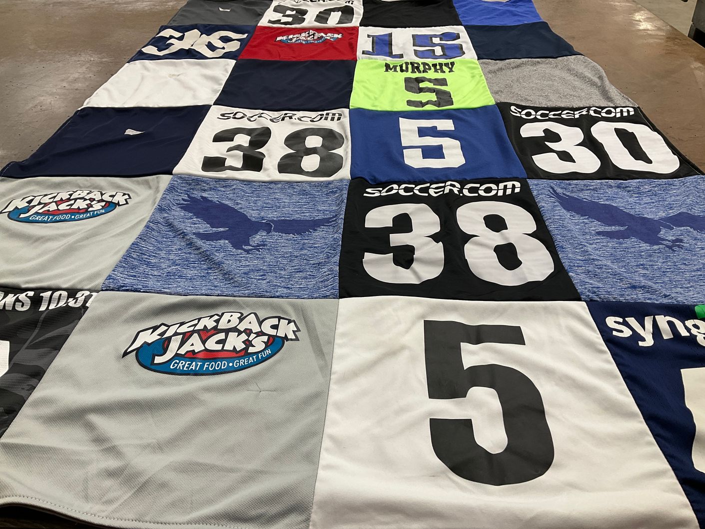 T-shirt quilt with soccer themes by Giuliana from NC