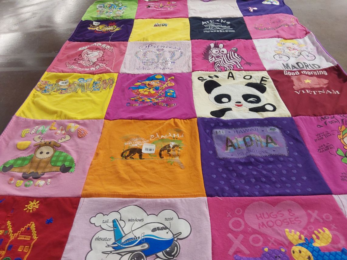 T-shirt quilt with travel, colors themes by Leslie from IL