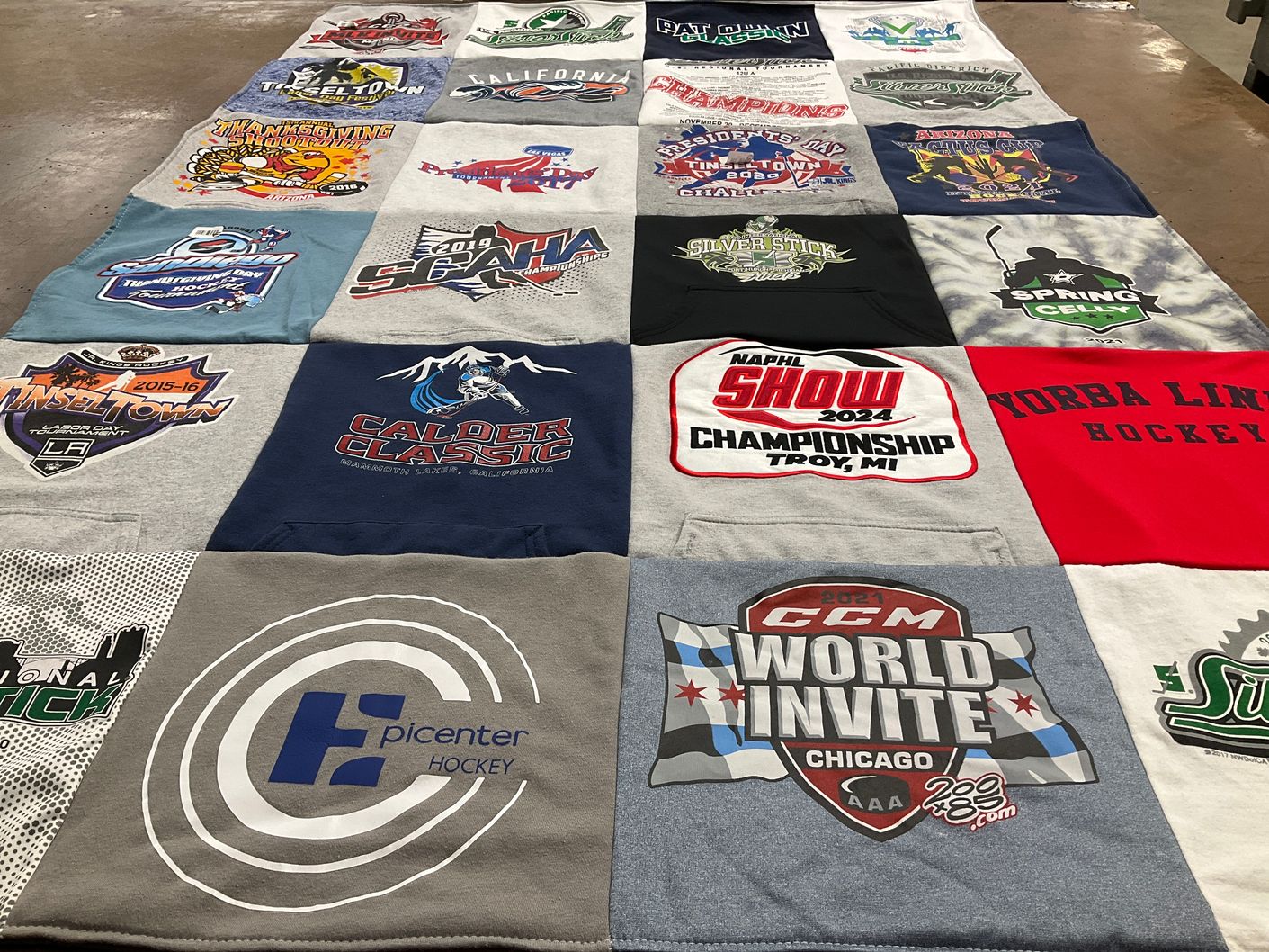 T-shirt quilt with hockey themes by elisa from CA