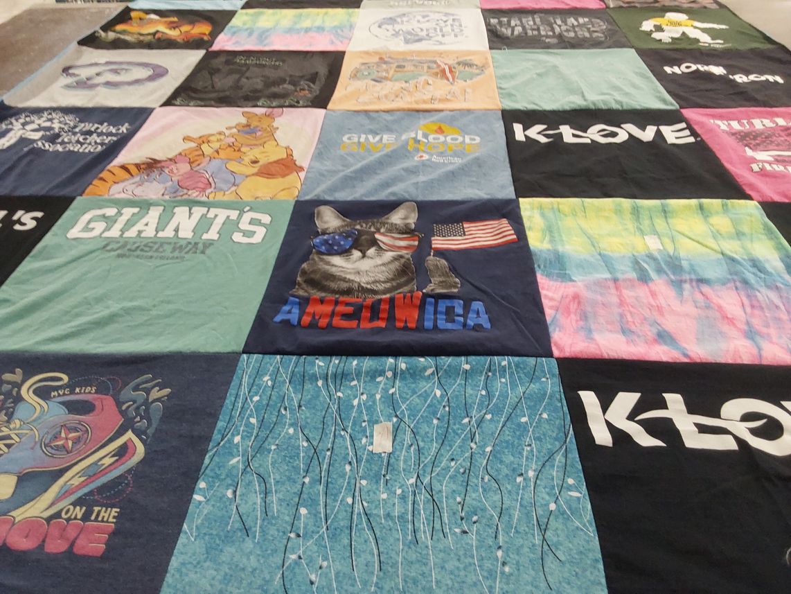 T-shirt quilt with disney, music themes by Jamie from CA