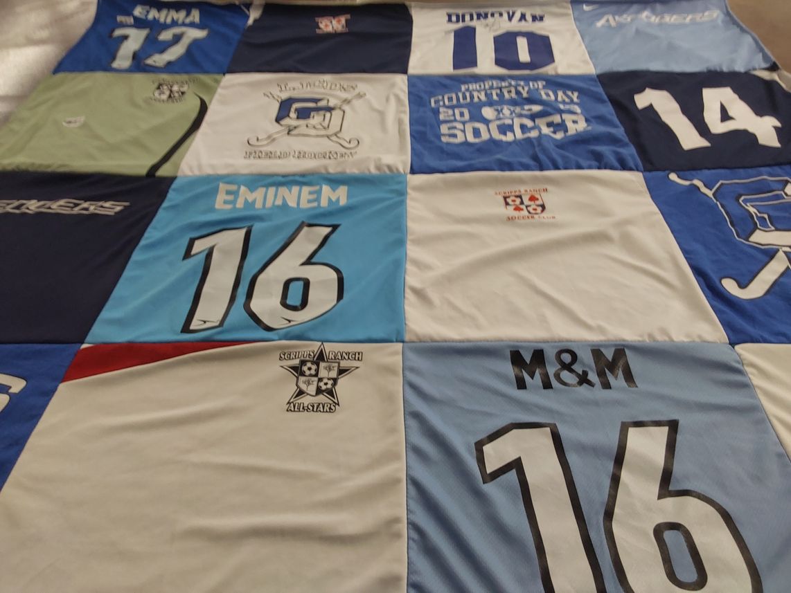 T-shirt quilt with soccer themes by Emma from CA