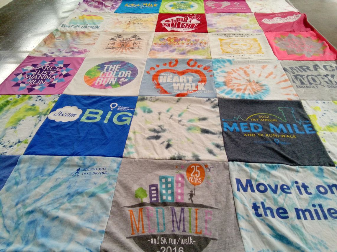 T-shirt quilt with running, events themes by Sharla from MO