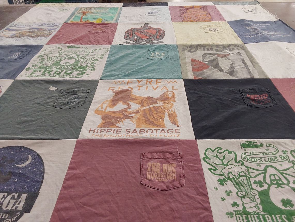 T-shirt quilt with music festivals, arts and crafts themes by Megan from LA