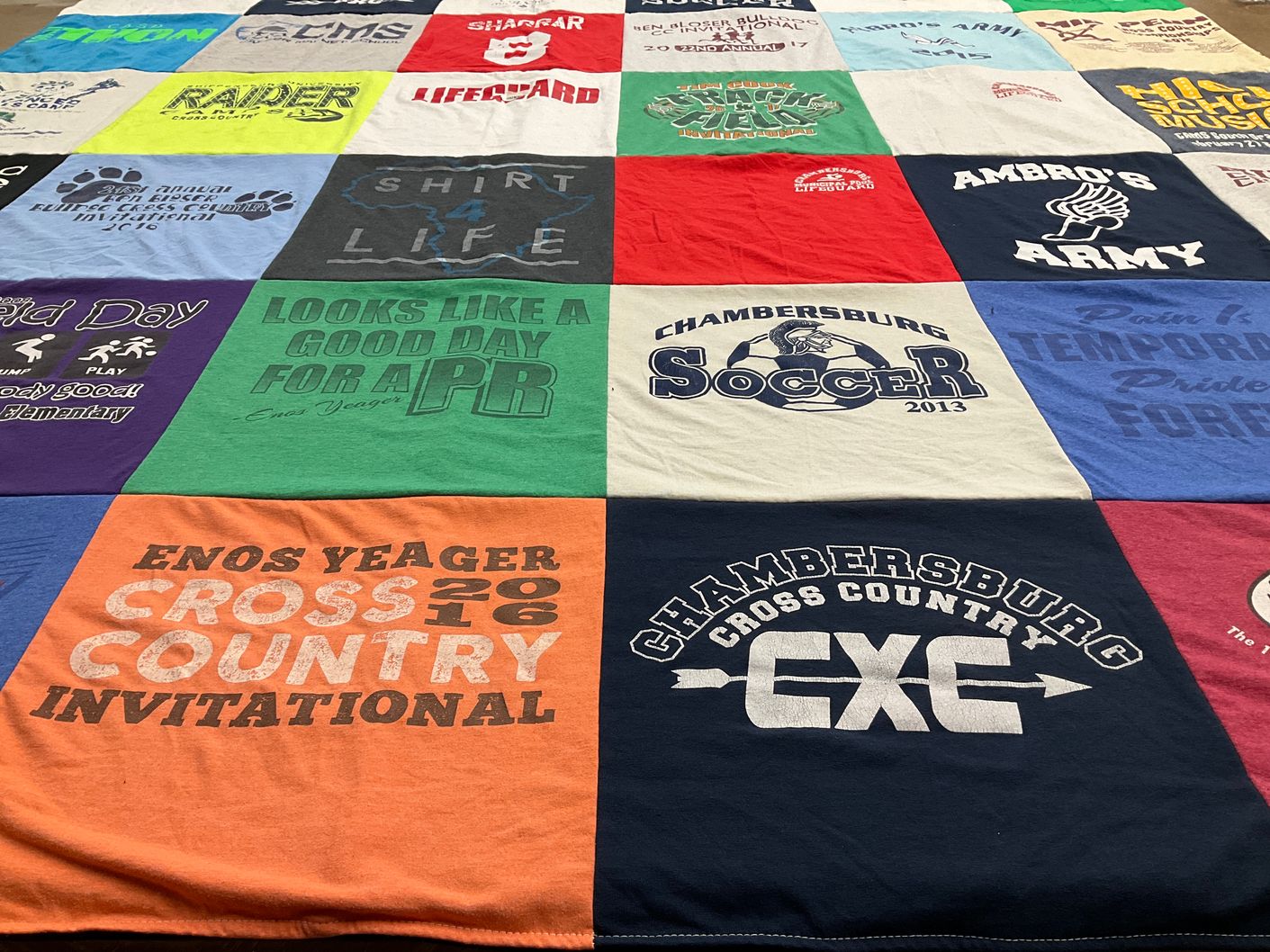 T-shirt quilt featuring chambersburg soccer team, chambersburg cross country team by Sara from PA