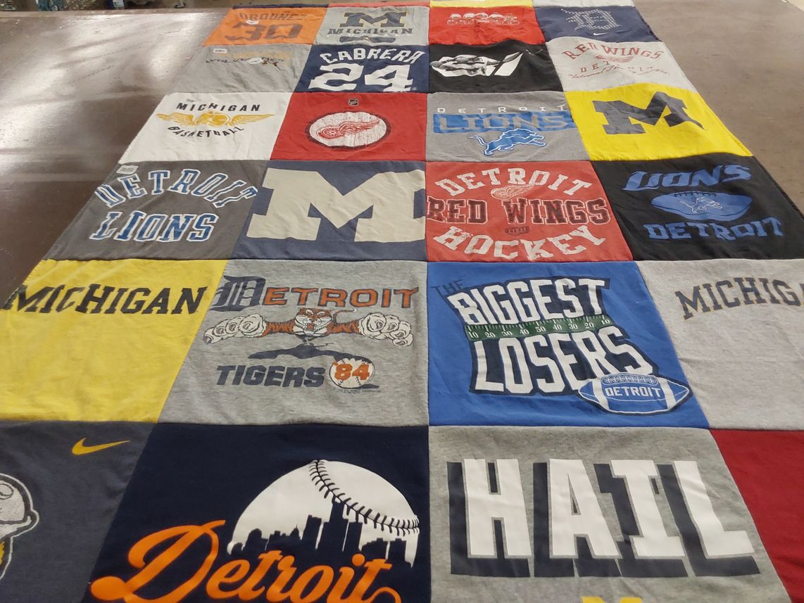 T-shirt quilt featuring detroit lions, detroit red wings by Melissa from WI