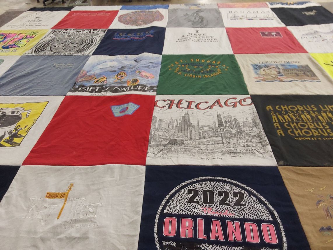 T-shirt quilt with travel, music themes by AnnaLynn from IL