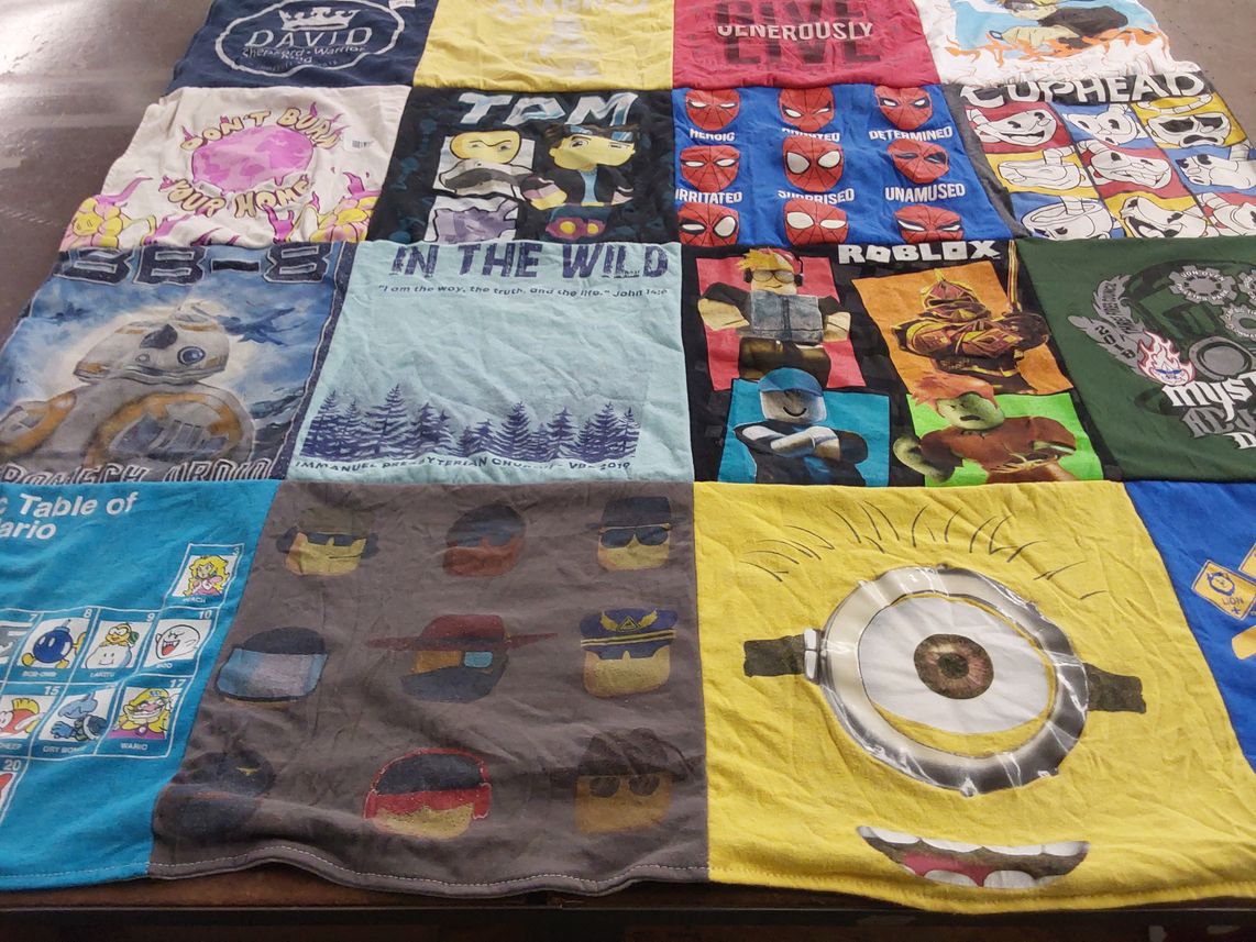 T-shirt quilt with video games, movies themes by Leslie from IL