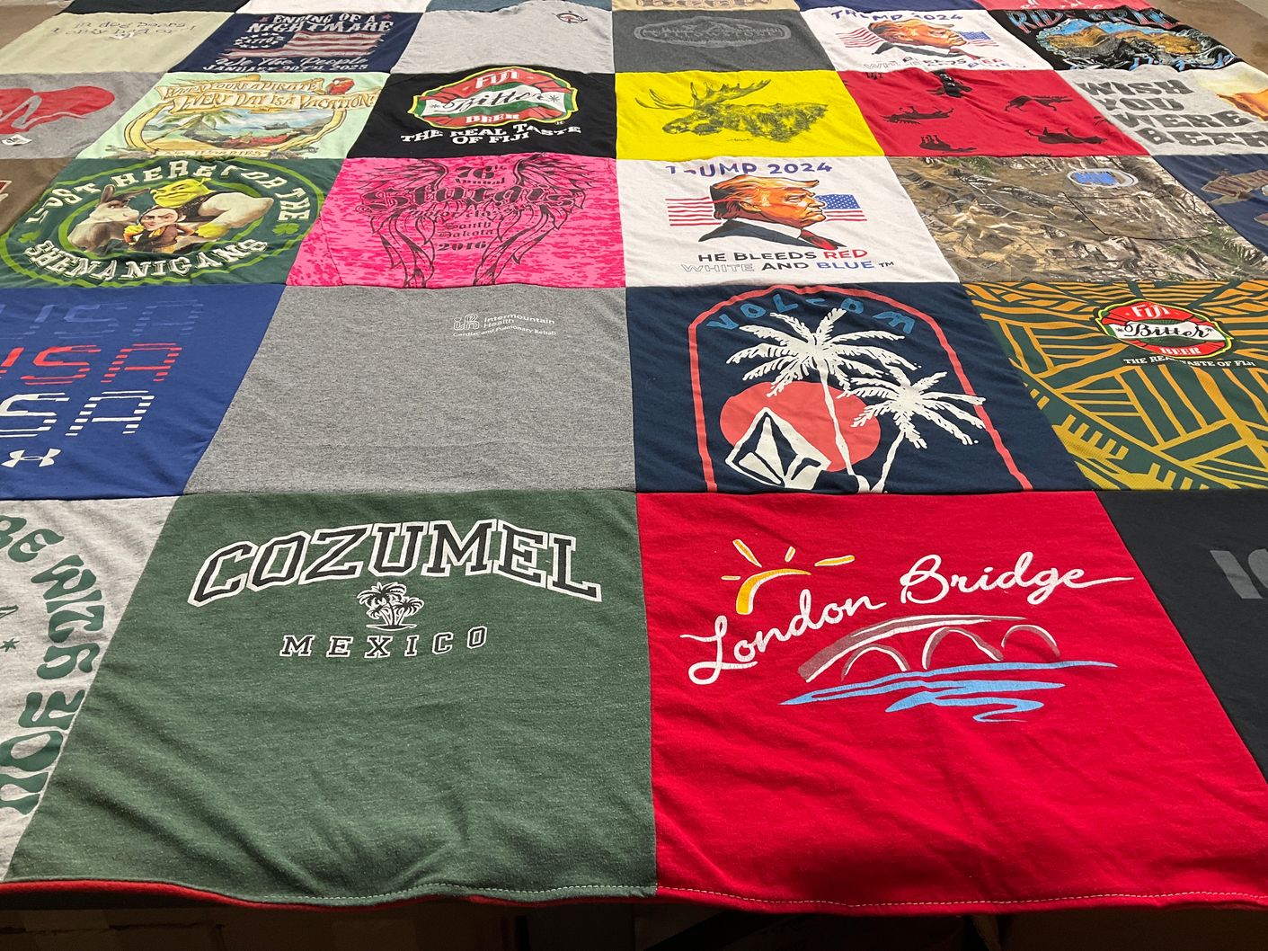 T-shirt quilt with travel, politics themes by Kim from UT