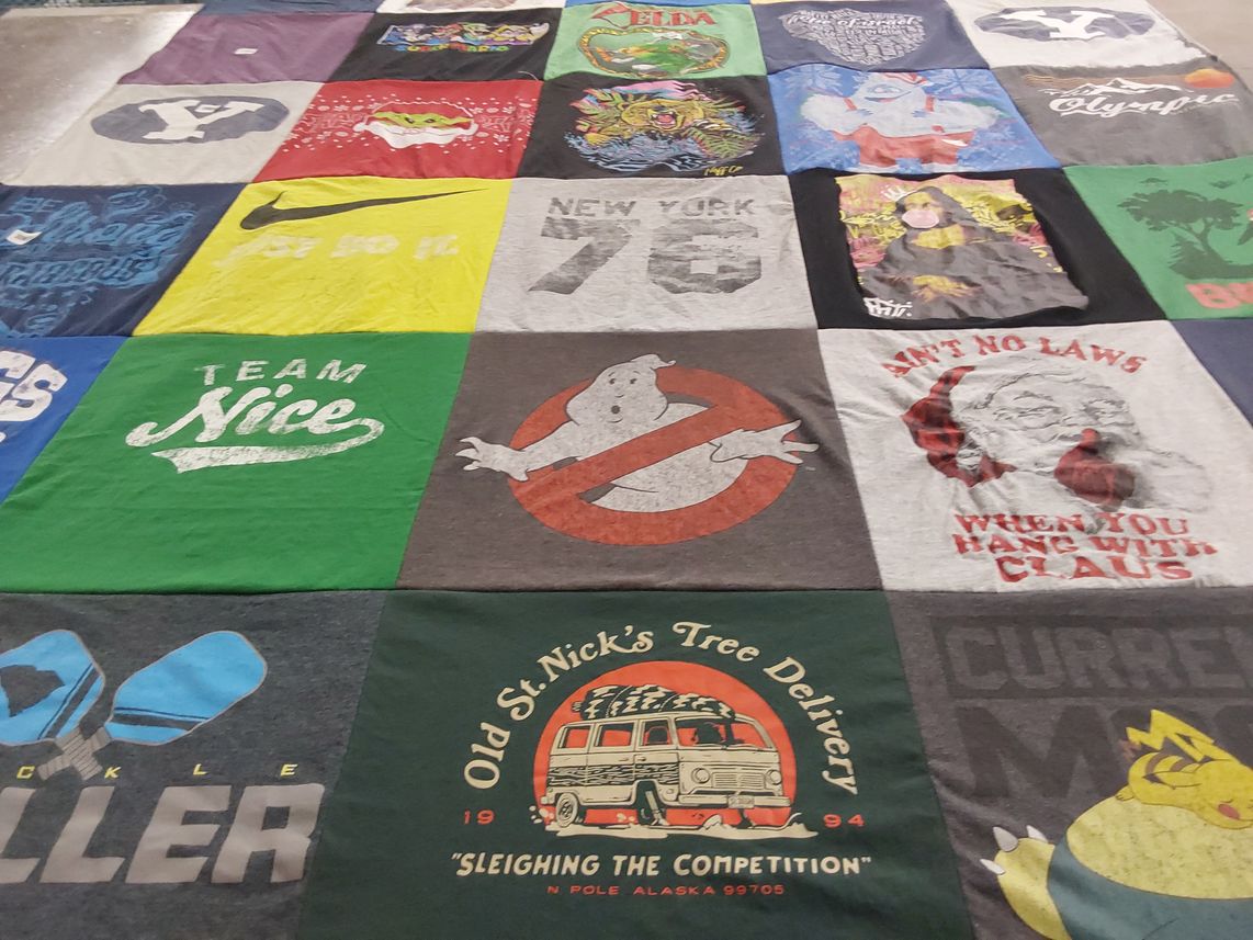 T-shirt quilt with sports, gaming themes by Melanie from NC