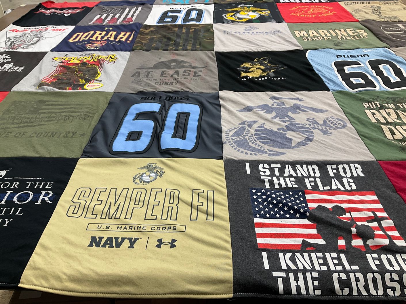 T-shirt quilt with military, patriotism themes by Jennette from CA
