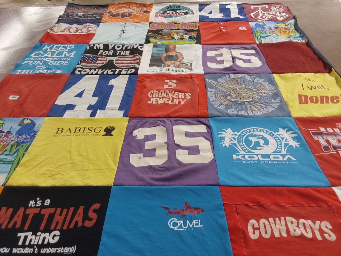 T-shirt quilt with surfing, support groups themes by Karen from TX