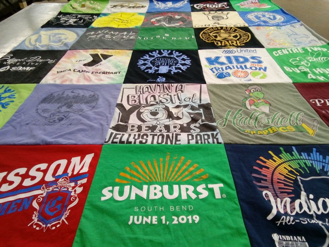 T-shirt quilt with camping, youth programs themes by Eric from IN