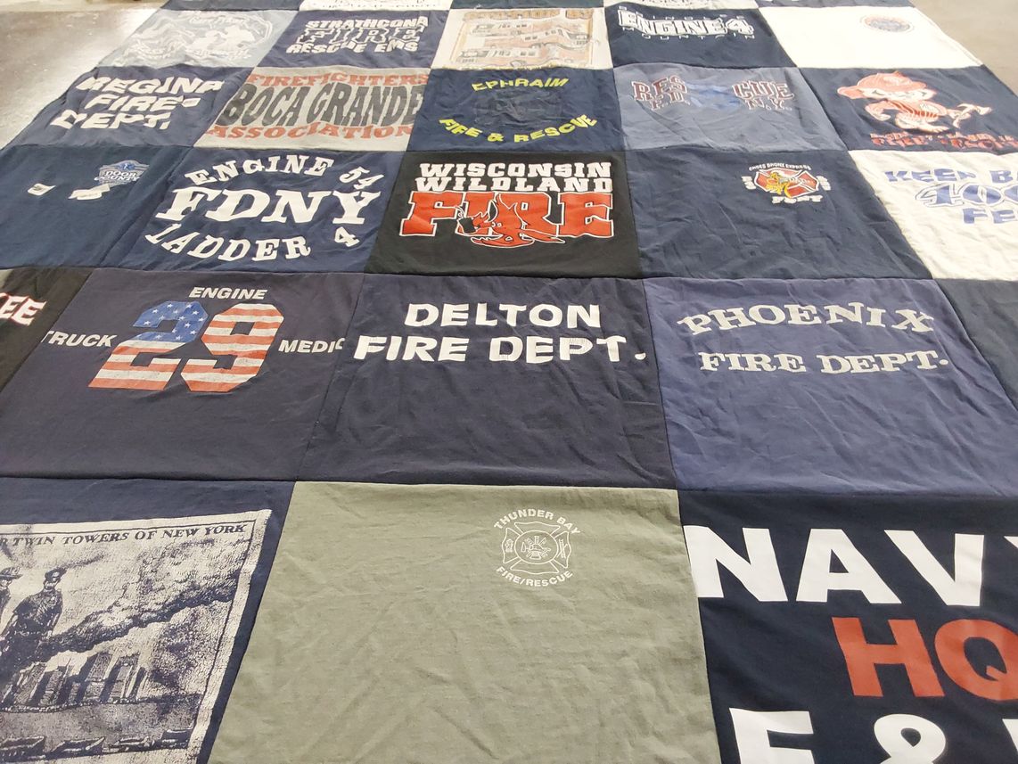T-shirt quilt with firefighting, rescue services themes by Liz from WI