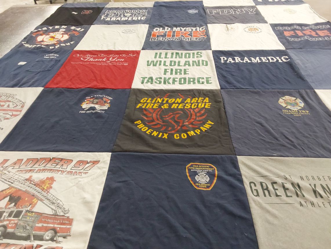 T-shirt quilt with firefighting, first responders themes by Liz from WI