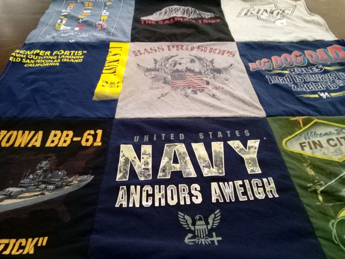 T-shirt quilt with military, fishing themes by Dana from CA