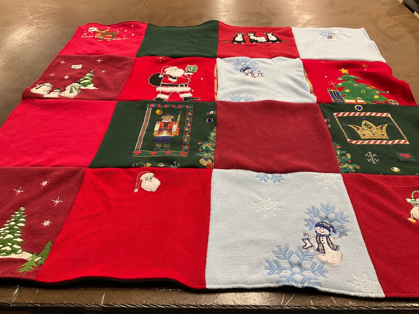 T-shirt quilt with holiday decorations, christmas themes by Shannon from MD