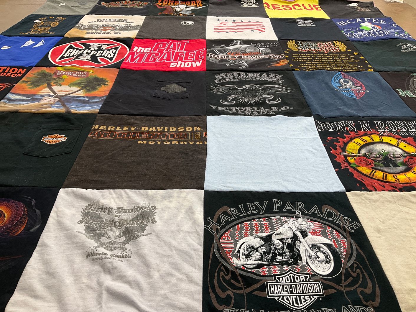 T-shirt quilt with motorcycling, music themes by Robert from CO