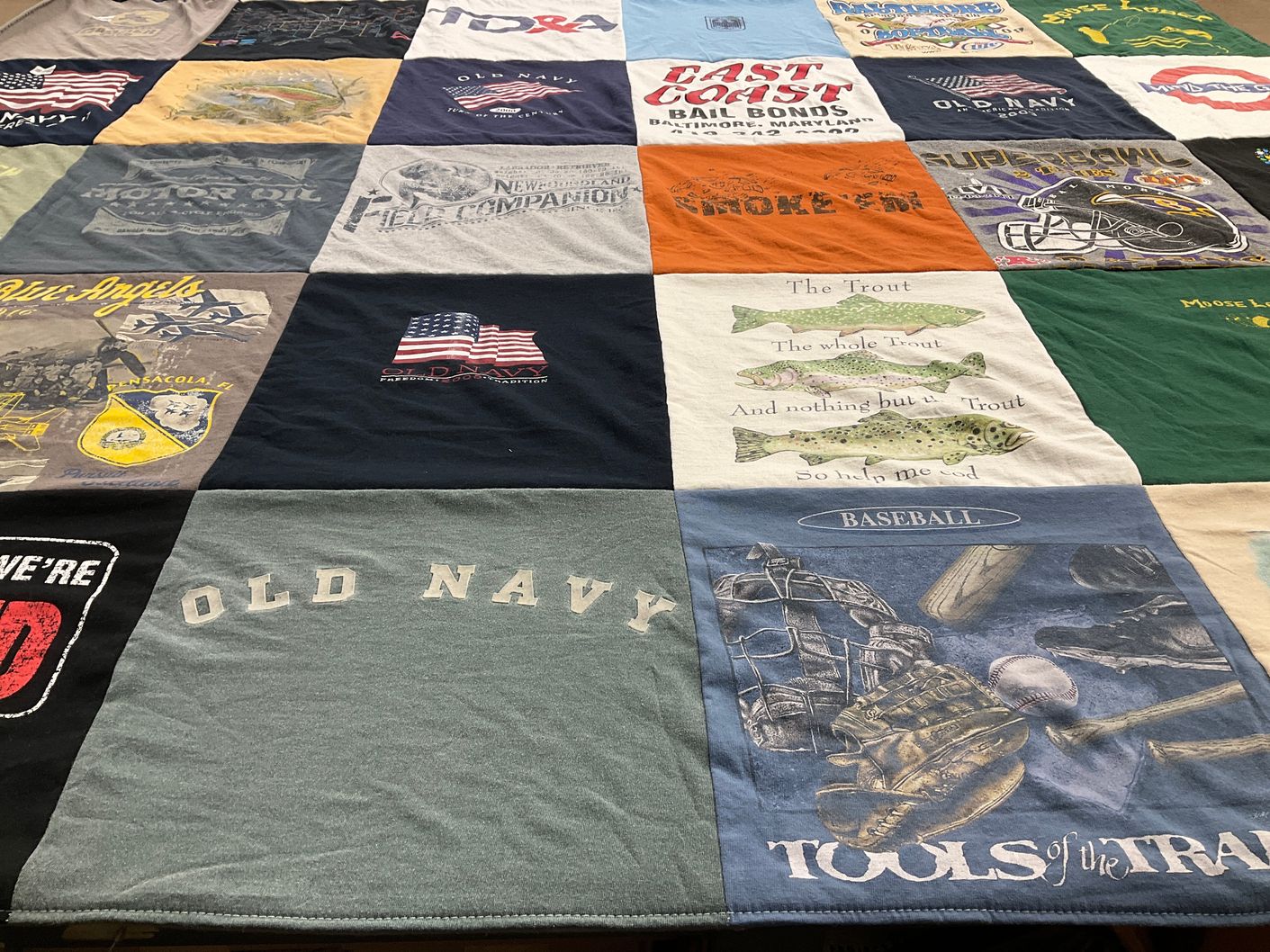 T-shirt quilt with fishing, sports themes by Jerome from MD