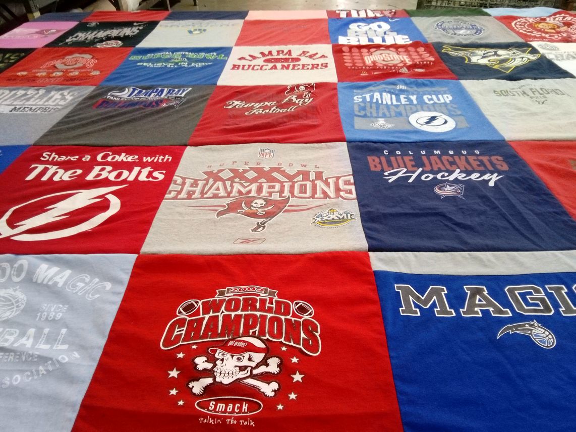 T-shirt quilt featuring tampa bay buccaneers, columbus blue jackets hockey by Tamara from FL