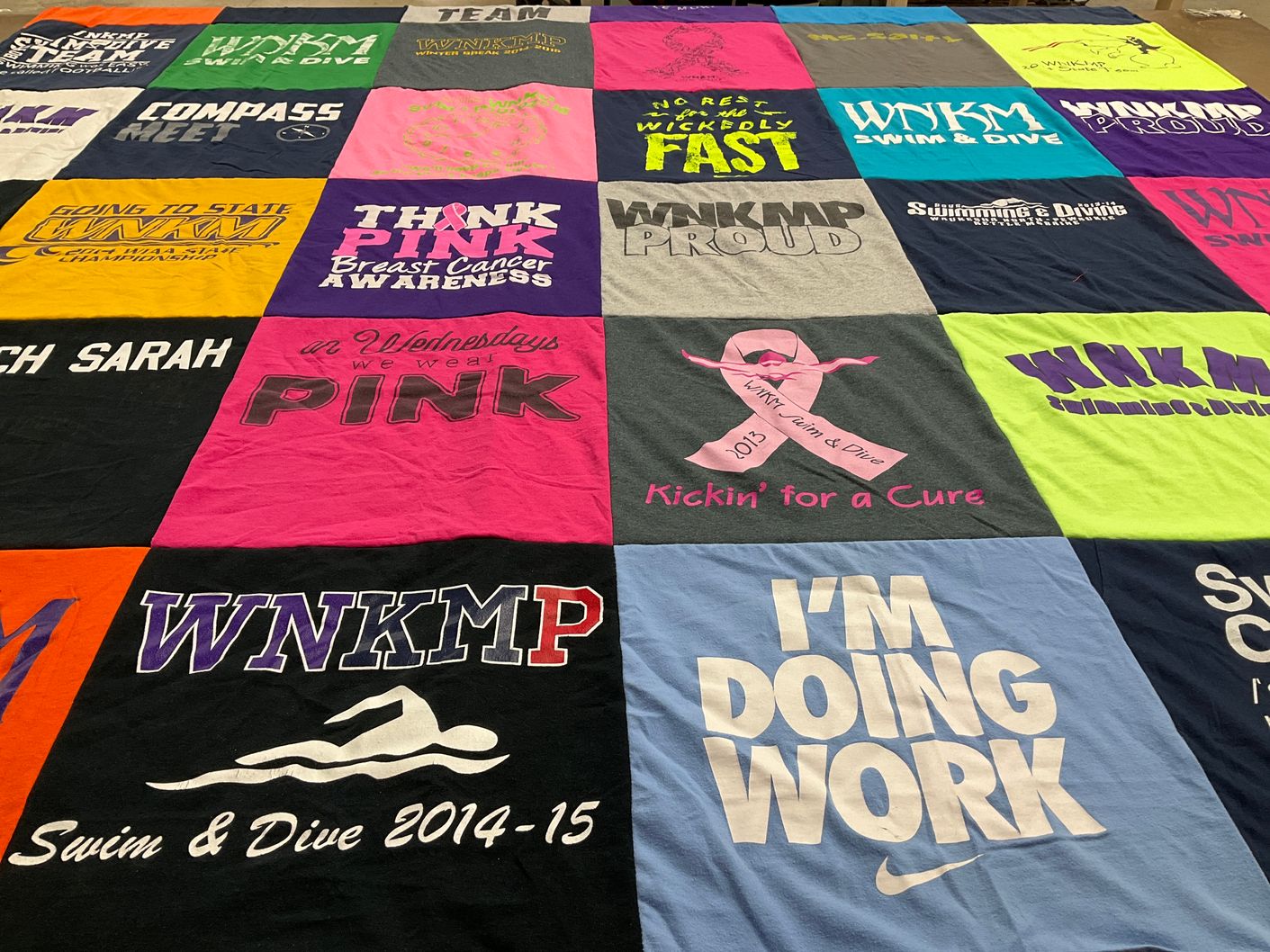 T-shirt quilt featuring wnkm swim and dive by Sarah from WI