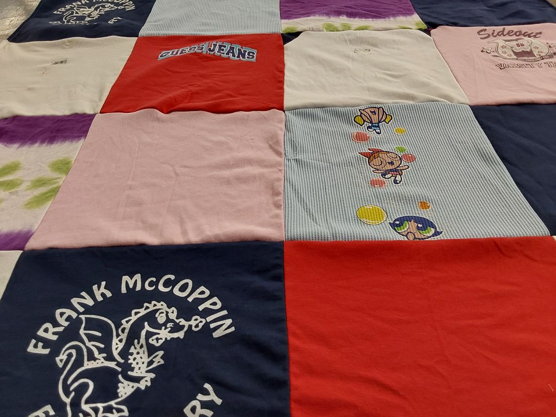 T-shirt quilt with fashion, animation themes by Trena from CA
