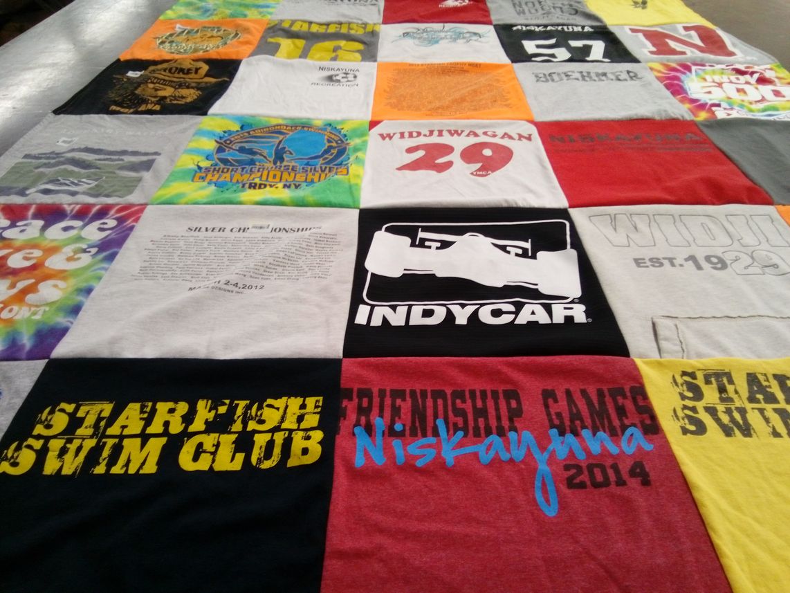 T-shirt quilt with swimming, racing themes by Michelle from NY