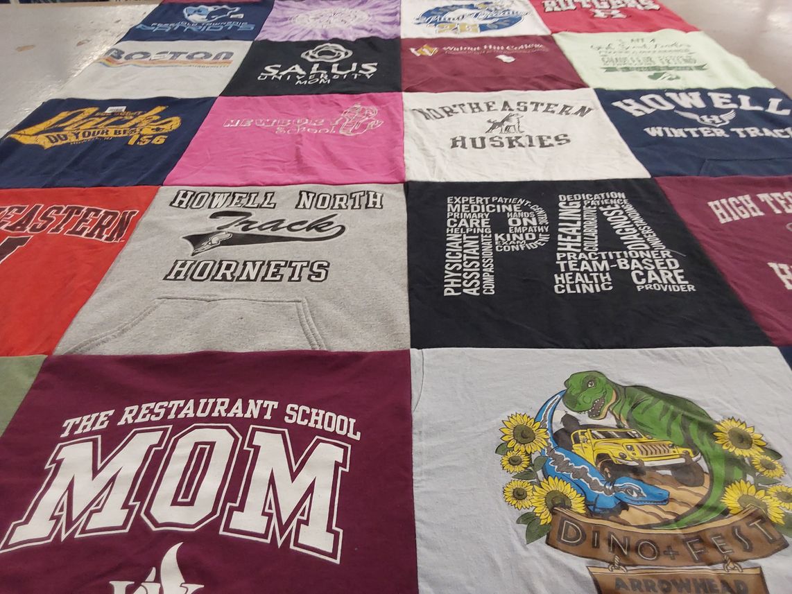 T-shirt quilt featuring northeastern huskies, howell north hornets by Elaina from NJ