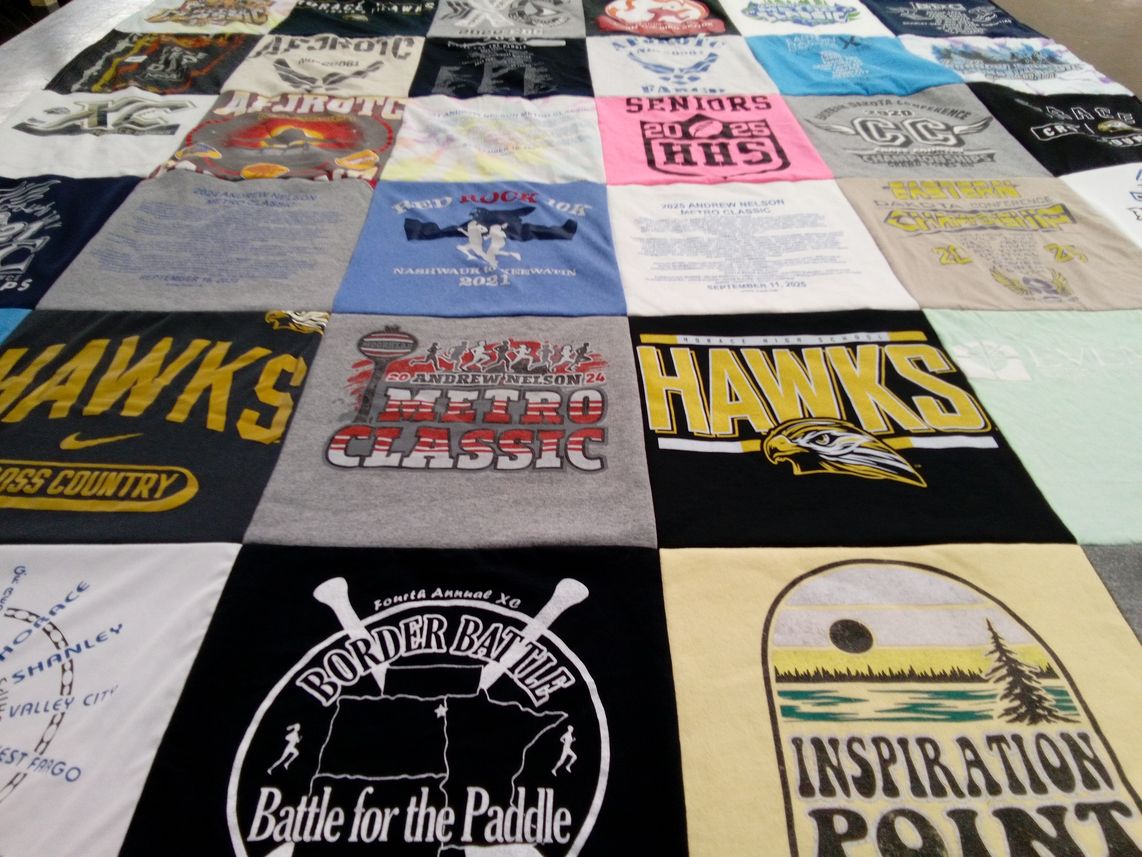 T-shirt quilt featuring andrew nelson high school hawks by Lyn from ND