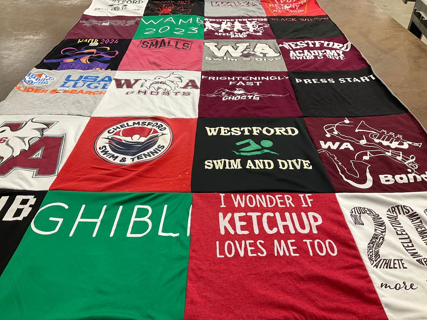 T-shirt quilt featuring chelmsford swim & tennis, westford academy swim and dive by Kate from MA