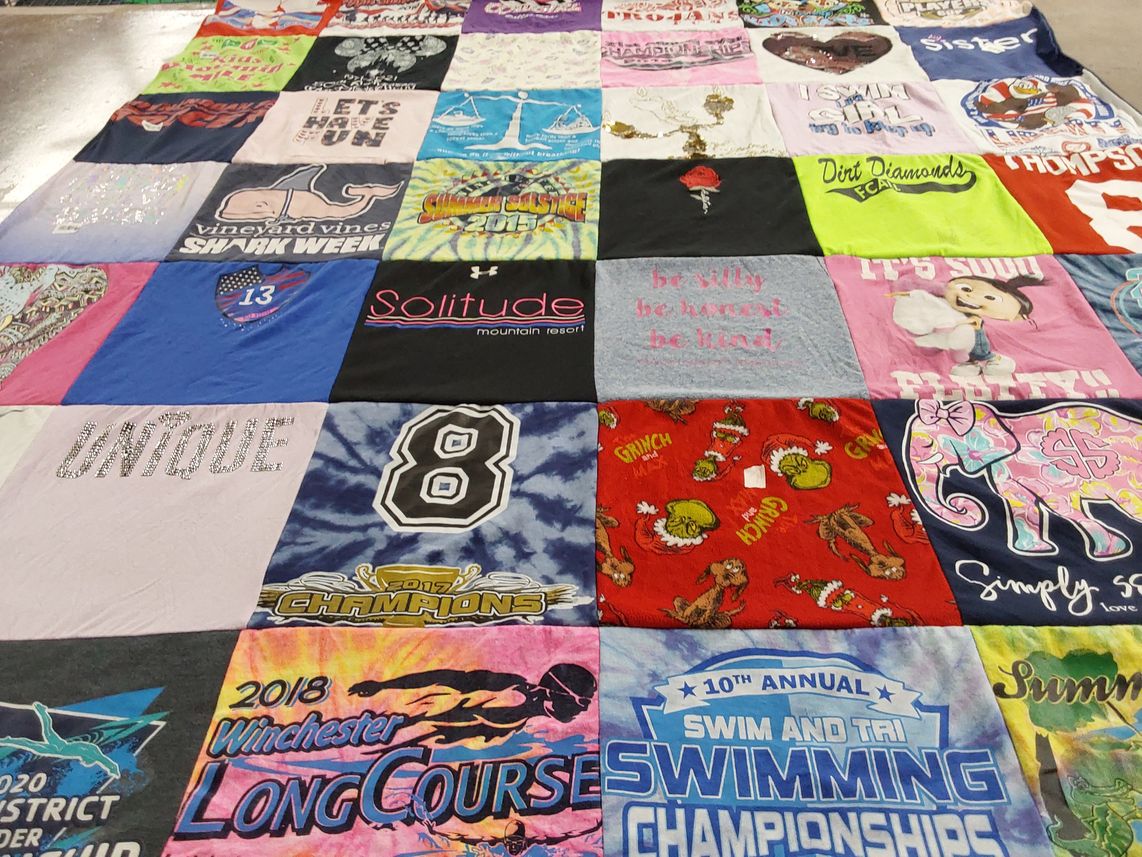 T-shirt quilt with swimming, outdoor activities themes by Faye from VA