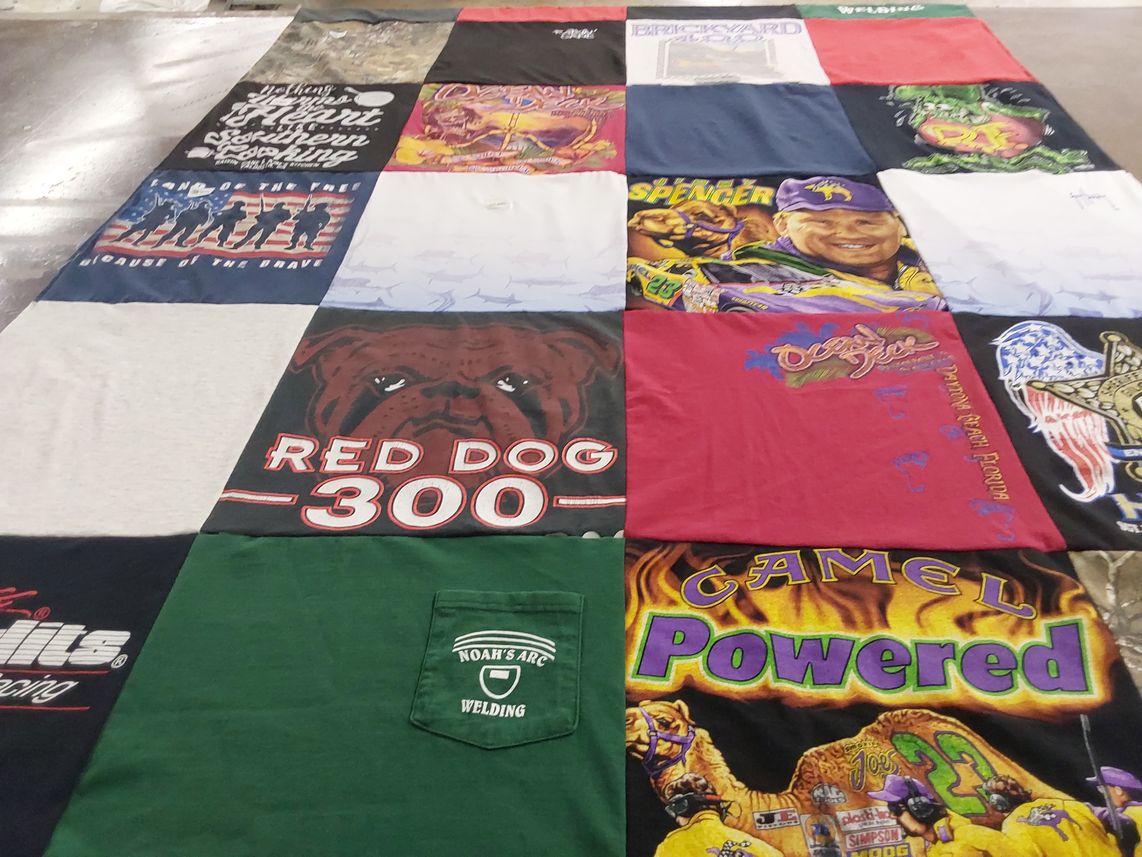 T-shirt quilt with racing themes by Heather from FL