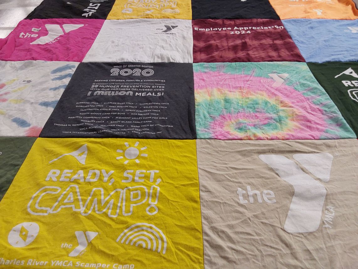 T-shirt quilt with community service, children's programs themes by Kendra from MA