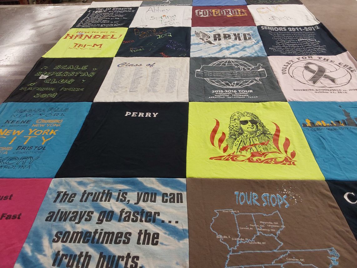 T-shirt quilt with music, community themes by Abbey from IL