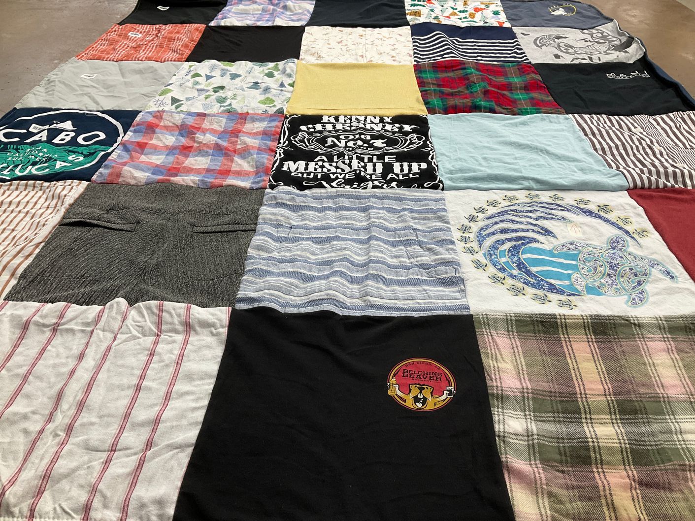 T-shirt quilt with beach, travel themes by Diane from CA