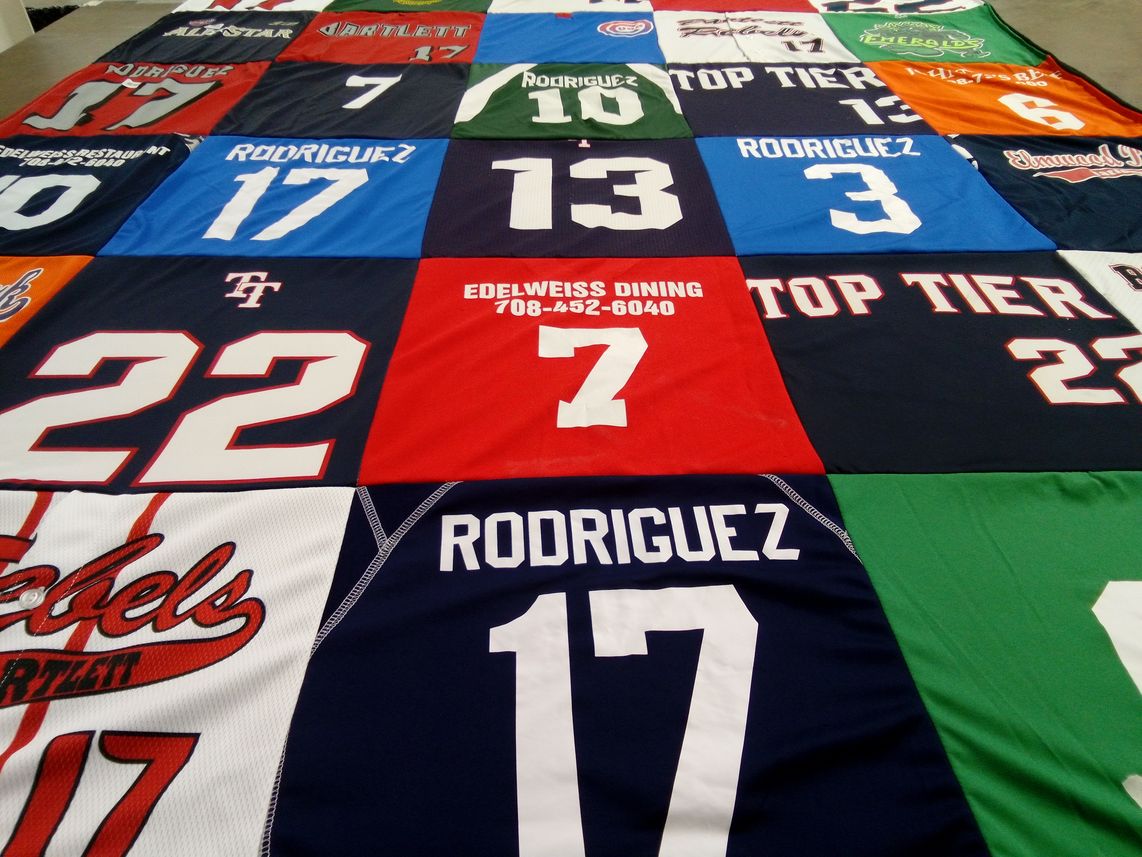T-shirt quilt with sports, dining themes by Lillian from IL
